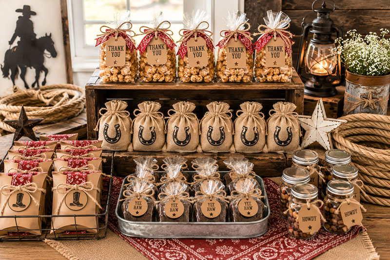Cowboy baby shower favors with western themed treats twine tags and take home gifts