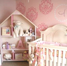 Elegant pink and ivory baby girl nursery with large damask stencil patterns on the wall