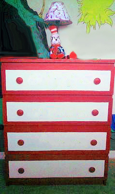 DIY hand painted Dr Seuss baby dresser with a Cat in the Hat nursery lamp