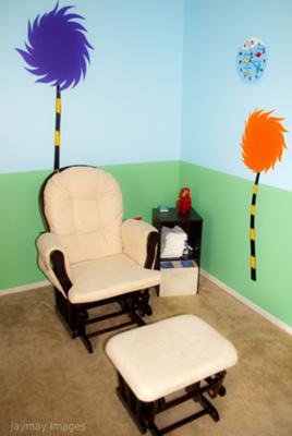 Dr. Seuss Truffula Trees Nursery behind our nursery glider rocker and ottoman.