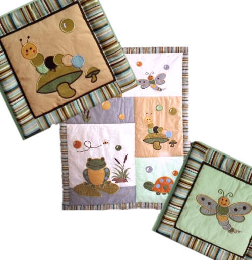 Baby crib quilt with frog dragonfly snail turtle and mushroom appliques for a crib bedding set in a pond nursery theme