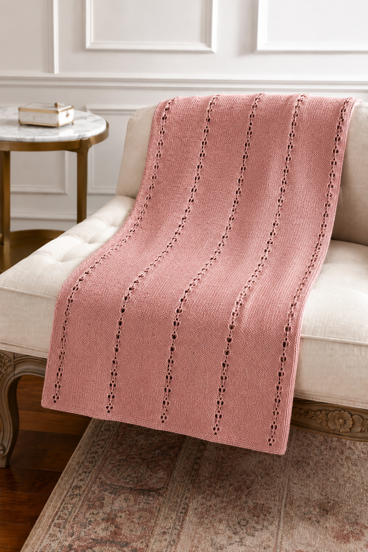 Easy knit baby blanket pattern with a simple textured stitch and neat knitted border