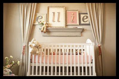 Ellie's nursery is a delight in baby girl pink, greige (a combination of gray and beige), and moss green.