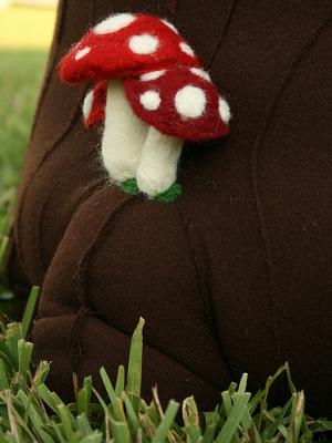 Wool Toadstools Closeup of the Enchanted Forest Theme Tree Stump Mushroom Nursery Ottoman 