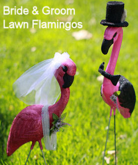 Lawn flamingos decorated as a bride and groom