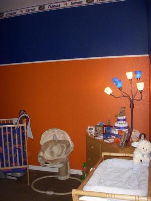 Our baby's royal blue and orange nursery color scheme is just one of the ways we support our favorite team! Gotta love those Gators! 
