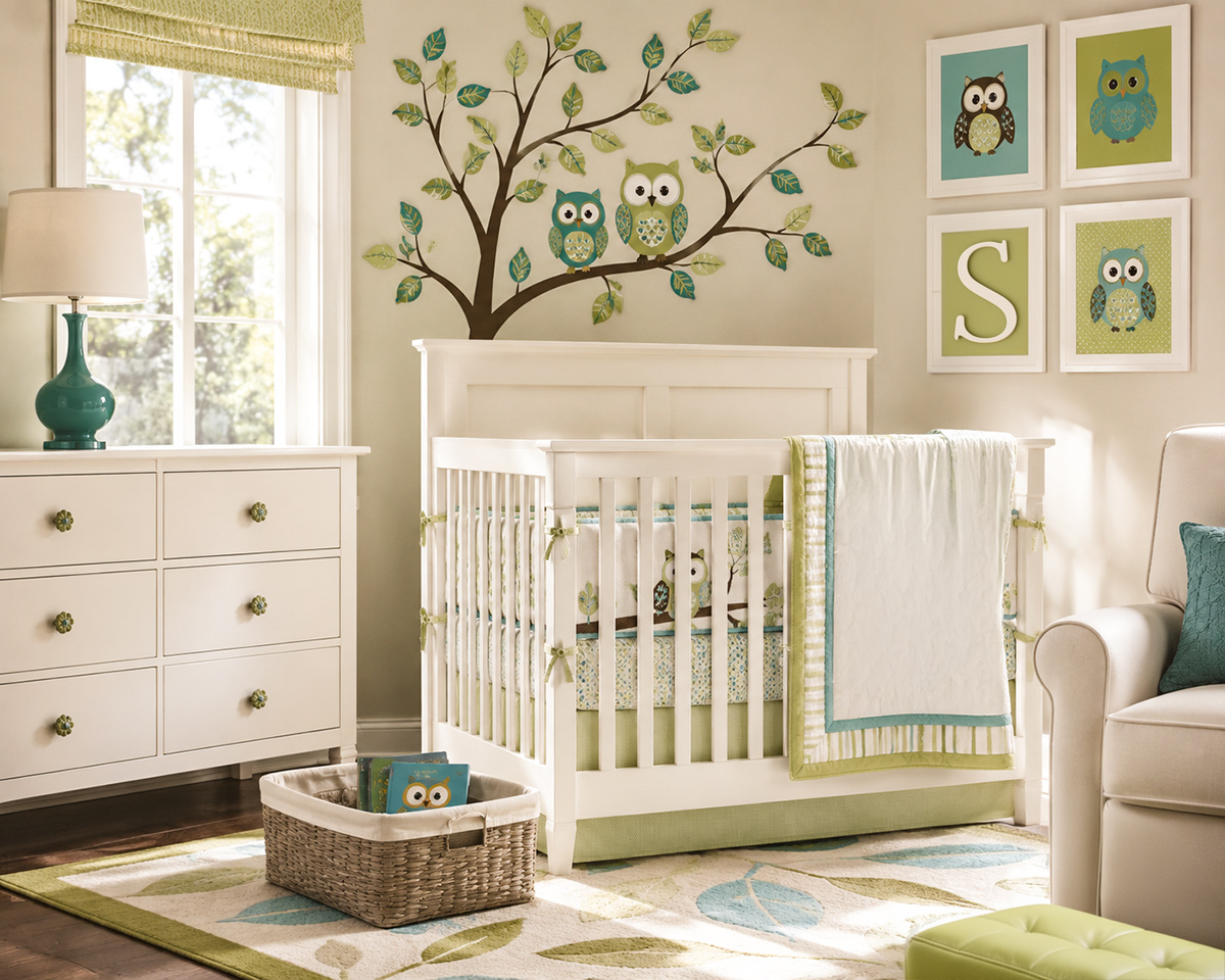 Gender neutral owl baby nursery with antique white furniture, lime green and turquoise accents, and a large owl tree wall decal