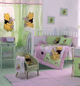 Pink Winnie the Pooh nursery ideas for a baby girl with crib bedding and appliqued curtains