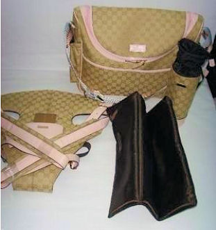 Authentic designer Gucci baby diaper changing bag bottle holder and baby carrier in pink for baby girls