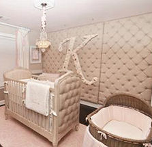 Pink baby girl princess nursery with tufted walls