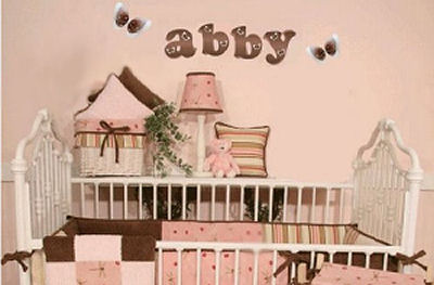 Personalized pink and brown ladybug wall letters for a baby girl ladybug theme nursery room