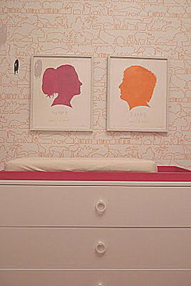 Pink and orange framed Jonathan Adler silhouette nursery wall art