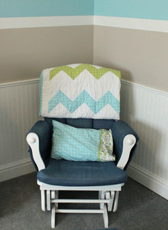 Nursery rocking chair with a (made by Grandma) chevron pattern baby quilt