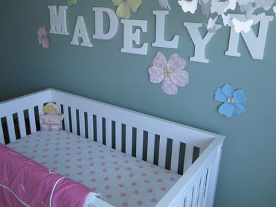 Madelyn's Modern White Baby Crib with Pink and White Polka Dot Fitted Crib Sheet 