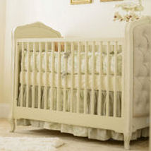 Classic Winnie the Pooh nursery decorated for a baby boy in neutral colors