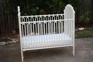 white metal crib