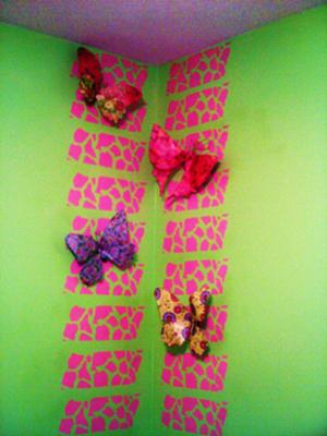 Handmade bandana patterned butterflies decorating my baby girl's nursery walls.