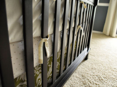 Vintage gold owls in a navy blue and white nursery decorated for a baby boy