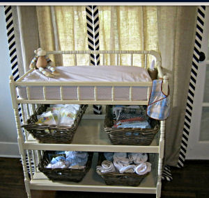 Our Jenny Lind style baby diaper changing table was a garage sale find