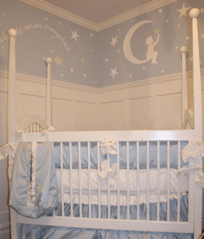 White and light baby blue boy nursery with a Goodnight Moon and stars wall mural