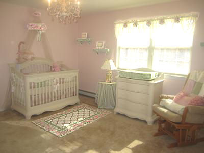 Pink white and sage green nursery for a baby princess