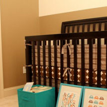 Dwell Studio chocolate dots baby crib bedding set for a baby boy brown aqua blue and orange nursery