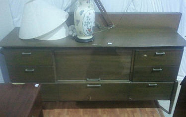 Vintage retro dresser ready found at a thrift store for a baby boy nursery ready to be refinished