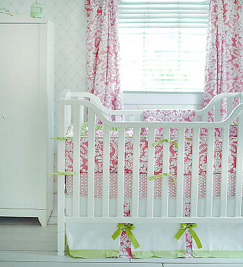 Elegant pink and white damask baby crib bedding with apple green accents for a baby girl