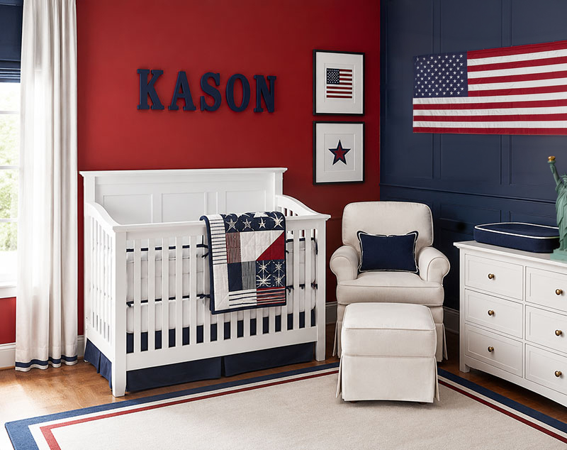 Patriotic red white and blue baby boy nursery bedding and room decor with white crib