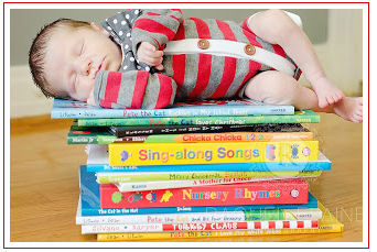 Newborn baby boy picture ideas with books and nursery rhymes