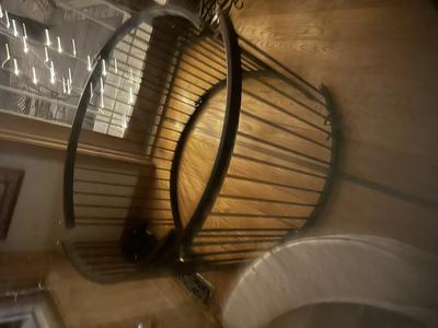 a brass Little Miss Liberty Frette Round Crib