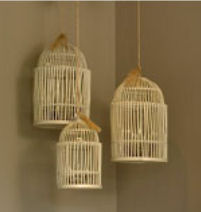 Rustic bamboo bird cages made of distressed wood make unique baby nursery ceiling mobiles