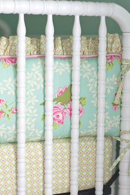 Custom floral baby girl crib bedding set for an aqua and pink nursery homemade by her talented grandmother