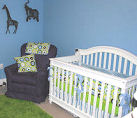 Baby blue boy nursery room with polka dots and jungle animals