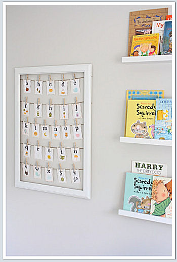 ABC nursery wall hanging beside the book shelf