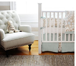 Light taupe brown and baby blue boy nursery with custom crib bedding set and decor