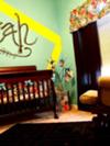 Modern abstract teal blue and lime green nursery with a twist!