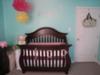 Crib wall of our baby girl's aqua owl themed nursery