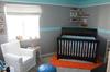 Our baby boy's jungle safari nursery is bubbling with color and fun with some modern elements; an infant's private playground