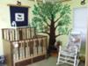 Baby Keith's unique nursery with homemade baby crib made from hardwoods including maple, oak, and black walnut woods that dad dovetailed.  