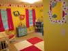 Our baby boy's Dr Seuss nursery with bright yellow walls and red white and blue decorations
