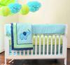 Turquoise blue and green elephant baby crib bedding with zig zag chevron pattern fabric