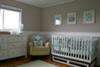 View of the baby's traditional/transitional nursery.  The colors are teal, aqua blue and avocado green.  