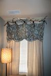 Nursery curtains that I made myself using silver, blue and ivory cream color fabric