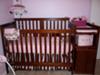 Our baby girl's crib and elegant pink and brown damask pattern baby bedding set