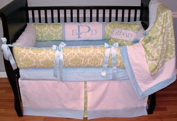 This Modpeapod custom baby bedding is the perfect inspiration for a white and lime green nursery for a baby boy.