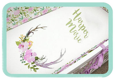 Lilac lavender forest woodland deer theme personalized crib bedding set for a baby girl nursery room.