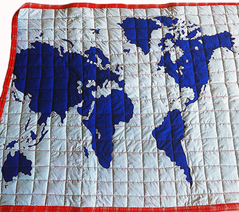 Baby crib quilt with world map applique pattern quilted squares
