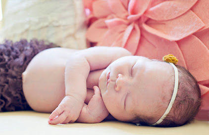 Precious newborn baby girl photo