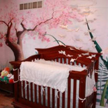 Floral butterfly baby girl nursery with tree mural and pink iris flowers wall mural